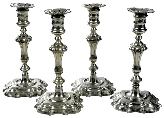 “It is rare to find a set of four candlesticks,” said Andrew Brunk of these mid-18th-century English candlesticks from the Ann and Joel Finn collection. The 9"x 4 5/8" x 4 5/8" quartet is made of paktong, an alloy of copper, nickel, and zinc invented by the Chinese. The candlesticks sold to the phones for $3198 (est. $2000/3000).