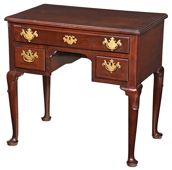The excellent condition of this 29" x 30" x 19" figured mahogany dressing table was reflected in its sale price of $49,200 (est. $20,000/30,000).