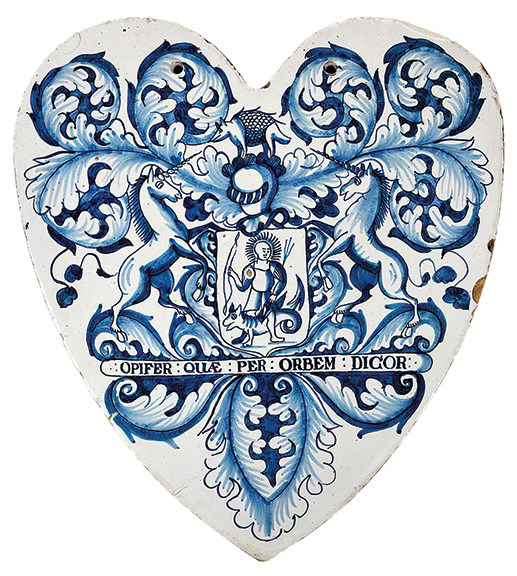 This heart-shaped Delft pill tile, inscribed with a crest similar to the Apollo pill tile, has elaborate foliate scrolls and measures 11 7/8" x 10¾". It sold for $51,660 (est. $12,000/15,000) to an English dealer, the same phone bidder who won the Apollo pill tile.