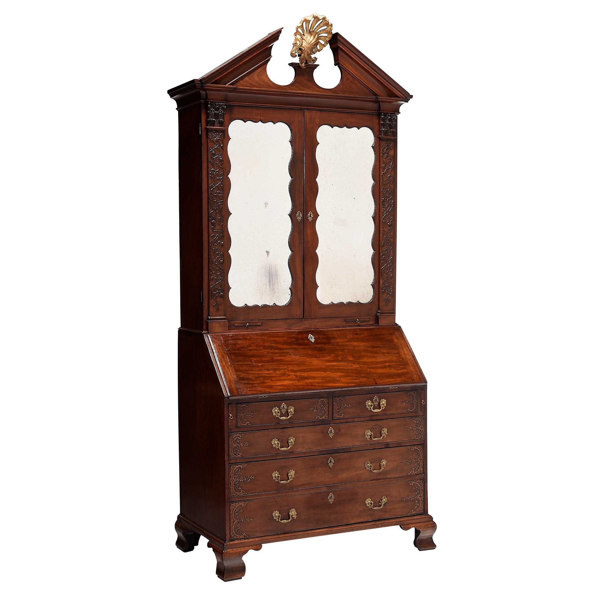 A Fine George III Blind Fretwork Carved and Parcel-Gilt Mahogany Mirror Door Bookcase